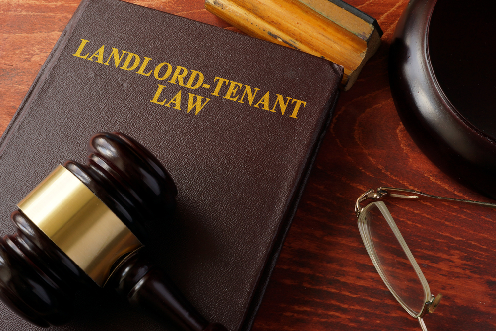 Book of landlord-tenant law and a gavel
