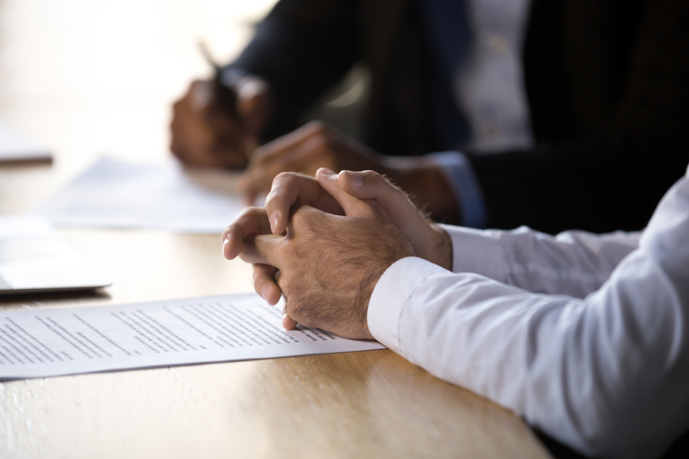 Photo of an Attorney Discussing with a Client