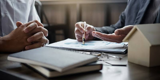 hand signing a document image Hand signing a document